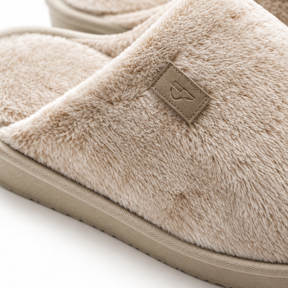 Faux fur texture and brand leather patch close-up detail